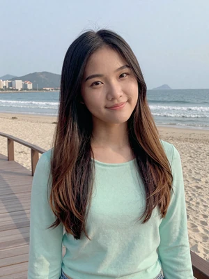 Lan, 23, Vietnamese woman from Da Nang on beach boardwalk