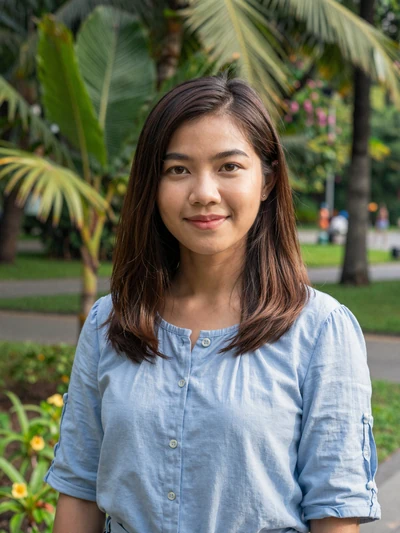 Suki, 27, verified Thai woman from Bangkok smiling in park